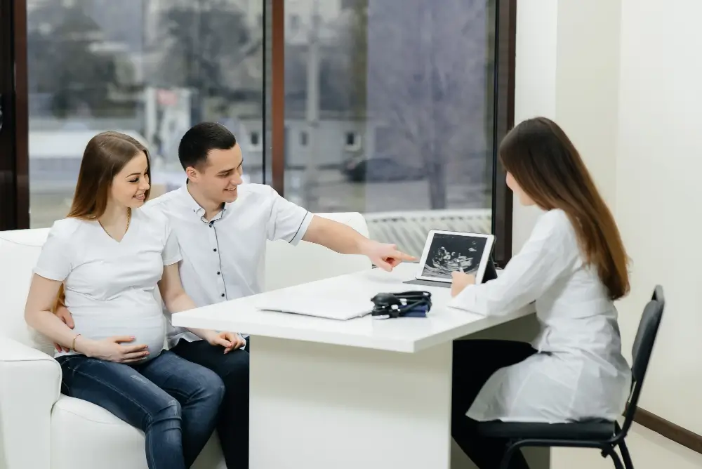 Gynecologist counseling a woman about medical termination of pregnancy (MTP)