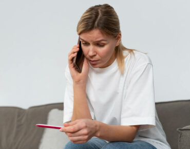 Woman discussing infertility with a fertility specialist despite normal medical reports